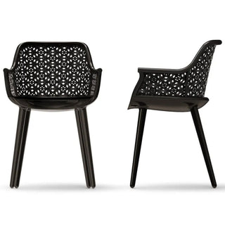Magis Cyborg Elegant armchair with glossy black frame and back in black wicker Buy on Shopdecor MAGIS collections