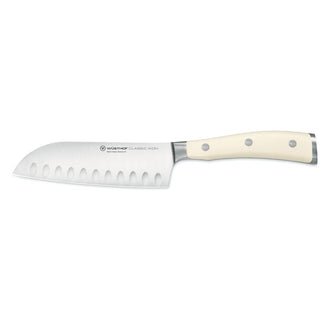 Wusthof Classic Ikon Crème santoku knife with hollow edge 14 cm. Buy on Shopdecor WÜSTHOF collections